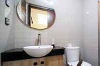 In-room Bathroom Strategic and Spacious 2BR at The Linden Apartment By Travelio