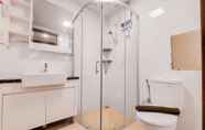 In-room Bathroom 7 Simple and Strategic 3BR Sky House BSD Apartment By Travelio