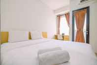 Bedroom Comfy and Good Deal Studio Apartment Transpark Cibubur By Travelio