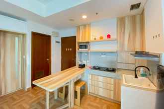 Common Space 4 Comfy and Great Location 1BR Apartment at Capitol Park Residence By Travelio