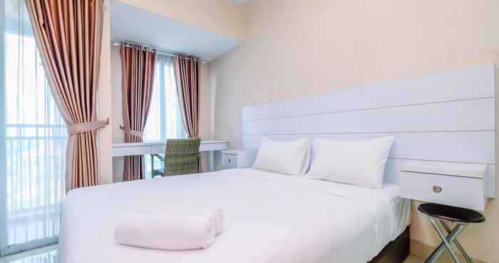 Bedroom Homey and Cozy Stay Studio Room Grand Dhika City Apartment By Travelio