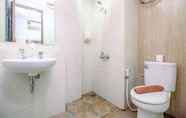 In-room Bathroom 4 Homey and Cozy Stay Studio Room Grand Dhika City Apartment By Travelio