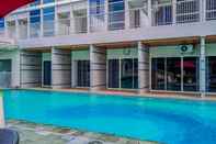 Swimming Pool Nice and Cozy Studio at Pacific Garden Alam Sutera Apartment By Travelio