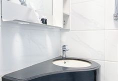In-room Bathroom 4 Nice Studio and Best Choice at Sky House BSD Apartment By Travelio