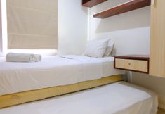 卧室 2 Modern and Homey Designed 2BR Apartment Parahyangan Residence By Travelio