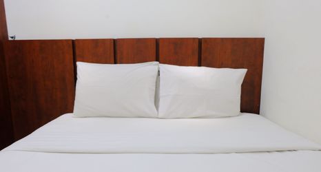 卧室 2 Modern and Homey Designed 2BR Apartment Parahyangan Residence By Travelio