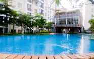 Swimming Pool 6 Simply Look and Comfort 1BR Apartment at Scientia Residence By Travelio