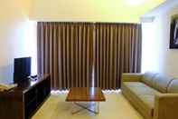 Lobby Modern Look 3BR at Braga City Walk Apartment By Travelio