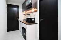 Others Simple and Modern Studio (No Kitchen) Apartment at Suncity Residence By Travelio