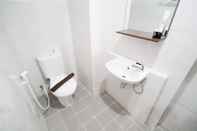 In-room Bathroom Simple and Modern Studio (No Kitchen) Apartment at Suncity Residence By Travelio