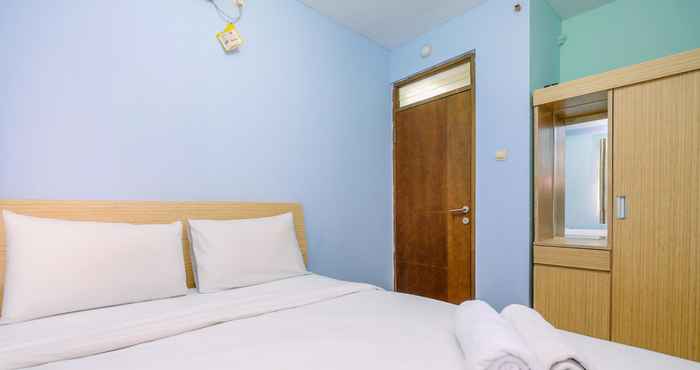 Kamar Tidur Modern Look 2BR Apartment at Bogor Valley By Travelio