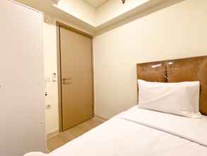 Kamar Tidur 4 Modern and Homey 2BR at 6th Floor Meikarta Apartment By Travelio