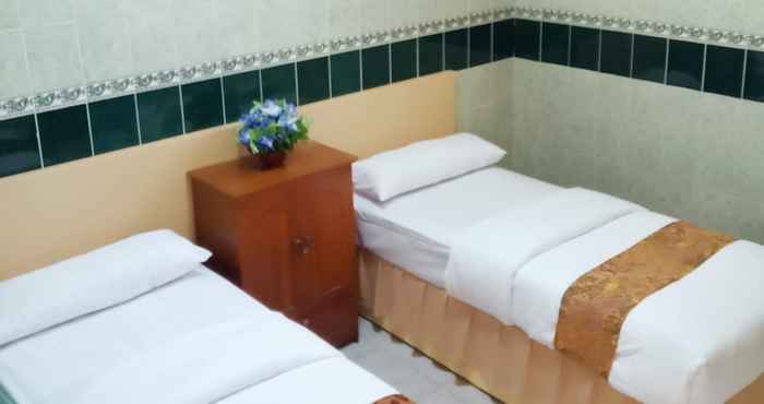 Kamar Tidur CAHAYA PURNAMA Guest House Syariah