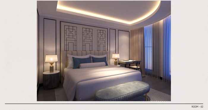 Phòng ngủ Charmant Suites - A Boutique Hotel Can Tho