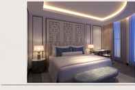 Phòng ngủ Charmant Suites - A Boutique Hotel Can Tho