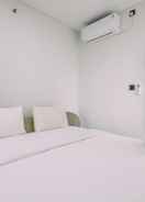 BEDROOM Comfy and Modern Look 2BR Transpark Cibubur Apartment By Travelio