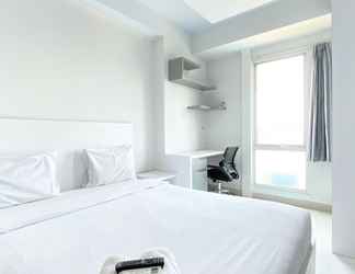 Bedroom 2 Nice and Minimalist Studio at Azalea Suites Apartment By Travelio