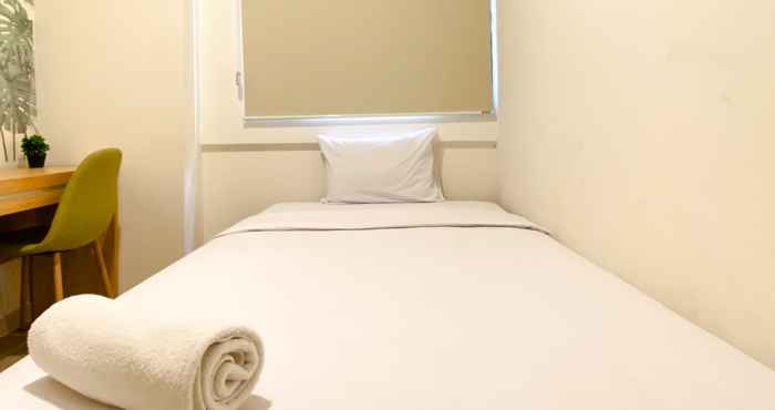 Kamar Tidur Homey and Spacious 2BR at Meikarta Apartment By Travelio