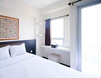 Bedroom 2 Homey and Nice Studio at Puri Mas Apartment By Travelio