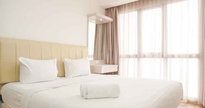 Bilik Tidur Homey and Minimalist 1BR M-Town Signature Apartment By Travelio