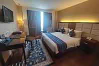 ห้องนอน Grand Qin Hotel Banjarbaru