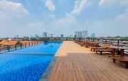 Swimming Pool 7 Wonderful and Spacious 1BR Tamansari Bintaro Mansion Apartment By Travelio