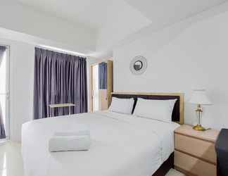 Bedroom 2 Homey Living Studio Apartment at Tamansari Bintaro Mansion By Travelio