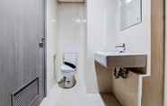 In-room Bathroom 6 Homey Living Studio Apartment at Tamansari Bintaro Mansion By Travelio