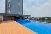 Swimming Pool Comfort and Simply Look 1BR Tamansari Bintaro Mansion Apartment By Travelio