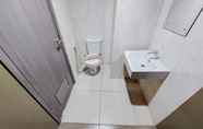 In-room Bathroom 4 Comfort and Simply Look 1BR Tamansari Bintaro Mansion Apartment By Travelio