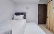 Kamar Tidur 2 Homey and Nice 3BR Tamansari Bintaro Masion Apartment By Travelio