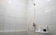 In-room Bathroom 6 Well Furnished and Best Deal 2BR Bassura City Apartment By Travelio