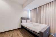 Bedroom Homey and Great Designed 2BR at Branz BSD City Apartment By Travelio