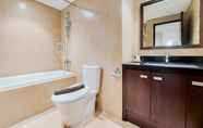 Toilet Kamar 6 Homey and Great Designed 2BR at Branz BSD City Apartment By Travelio