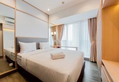 Bedroom 6 Comfort and Nice 2BR at Branz BSD City Apartment By Travelio