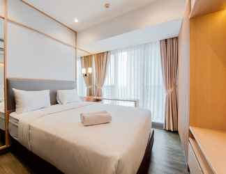 Bedroom 2 Comfort and Nice 2BR at Branz BSD City Apartment By Travelio