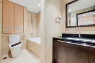 Toilet Kamar Comfort and Nice 2BR at Branz BSD City Apartment By Travelio