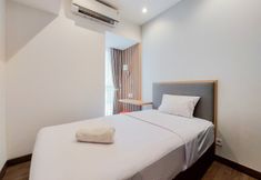 Bedroom 7 Comfort and Nice 2BR at Branz BSD City Apartment By Travelio
