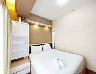 Kamar Tidur 2 Modern Look 1BR Apartment at Uttara The Icon By Travelio