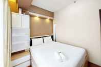 Kamar Tidur Modern Look 1BR Apartment at Uttara The Icon By Travelio