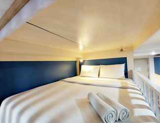 Bedroom 2 Cozy Stay Studio Apartment at Mataram City By Travelio