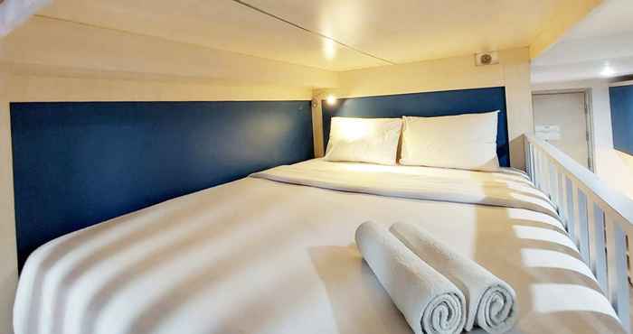 Bedroom Cozy Stay Studio Apartment at Mataram City By Travelio