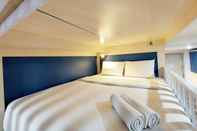 Bilik Tidur Cozy Stay Studio Apartment at Mataram City By Travelio