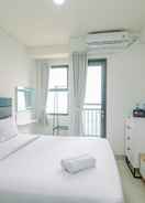 BEDROOM Modern and Comfy Studio Transpark Cibubur Apartment By Travelio