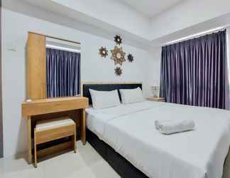 Bedroom 2 Cozy and Comfortable 2BR Tamansari Bintaro Mansion Apartment By Travelio