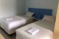 Kamar Tidur Blue Moon Hotel