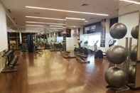 Fitness Center Warm Designed Studio at Apartment Orchard Supermall Mansion By Travelio