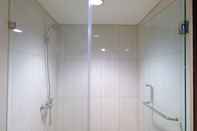 In-room Bathroom Homey 2BR at Tamansari La Grande Apartment By Travelio