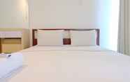 Bedroom 5 Homey 2BR at Tamansari La Grande Apartment By Travelio