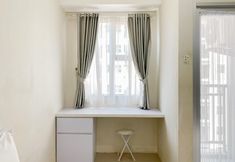 침실 6 Cozy and Minimalist Studio Transpark Juanda Bekasi Timur Apartment By Travelio